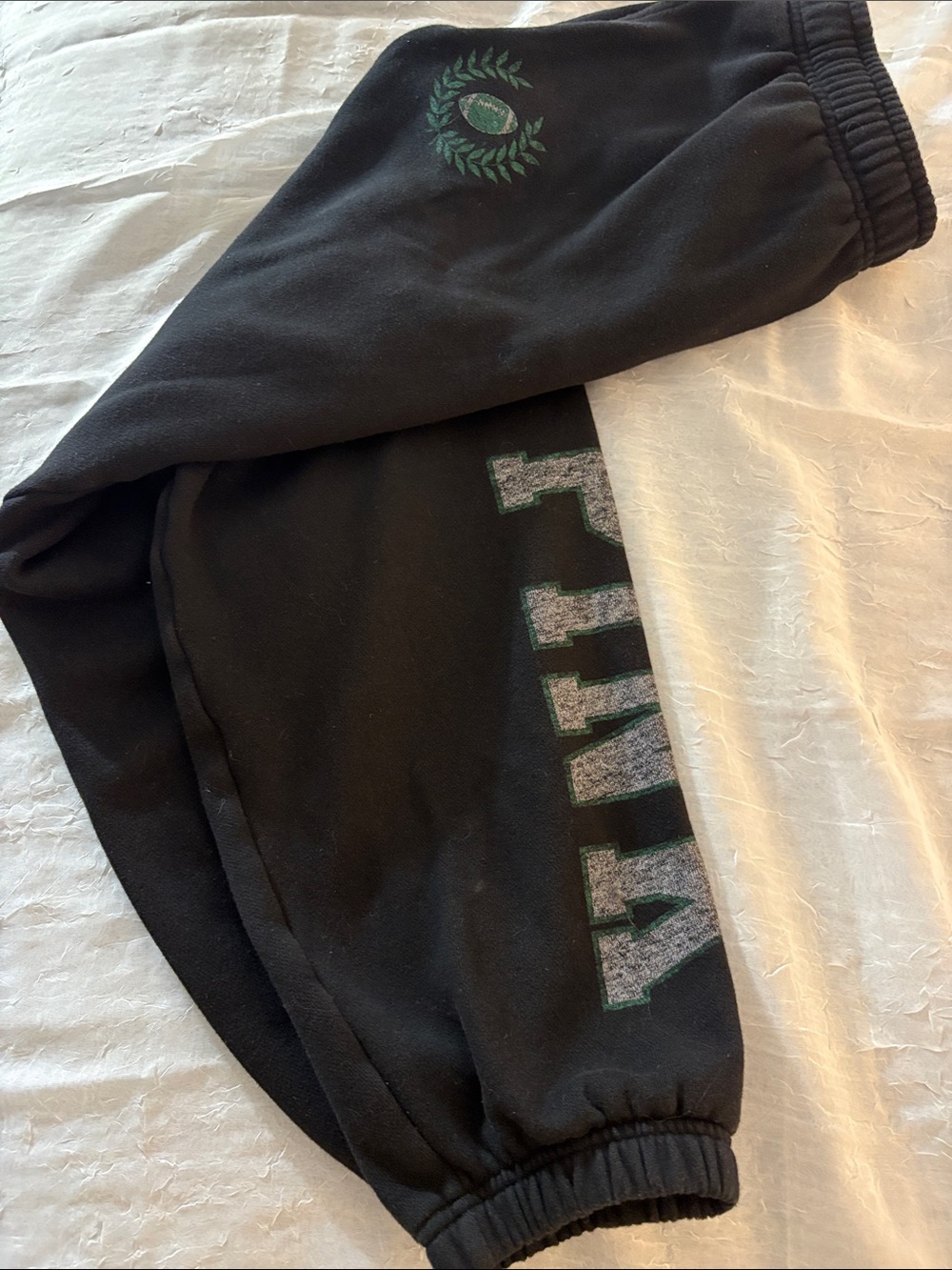 Victoria's Secret Black Sweatpants with Green Crest and Lettering